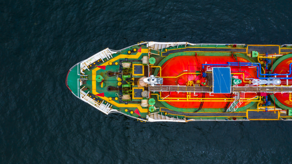 Top view of an oil tanker deck at sea showing marine fuel transfer systems and pipeline infrastructure used in bunker trading operations.